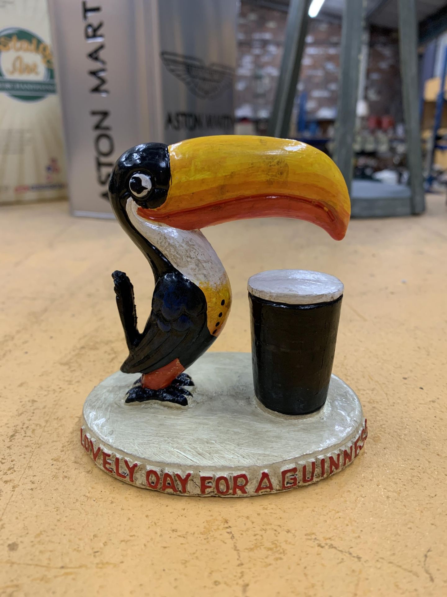 A CAST PAINTED GUINNESS TOUCAN MODEL