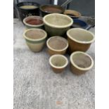 AN ASSORTMENT OF GLAZED GARDEN POTS