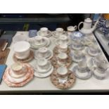 A LARGE QUANTITY OF VINTAGE CHINA TO INCLUDE CUPS, SAUCERS, PLATES, A COFFEE POT, ETC