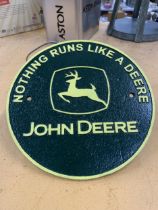 A CAST METAL JOHN DEERE SIGN