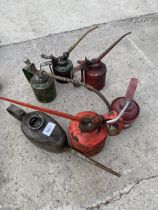 AN ASSORTMENT OF VINTAGE PUMP ACTION OIL CANS TO INCLUDE A WESCO EXAMPLE