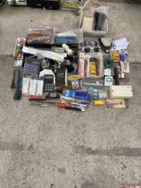 AN ASSORTMENT OF ITEMS TO INCLUDE SUN GLASSES, STATIONARY AND TOOLS ETC