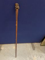 A VINTAGE WALKING STICK WITH BRONZE EFFECT MAN TOP