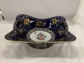 A LIMOGES HAND PAINTED TWO HANDLED DISH