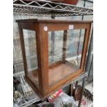 A VINTAGE OAK AND GLASS DISPLAY CABINET