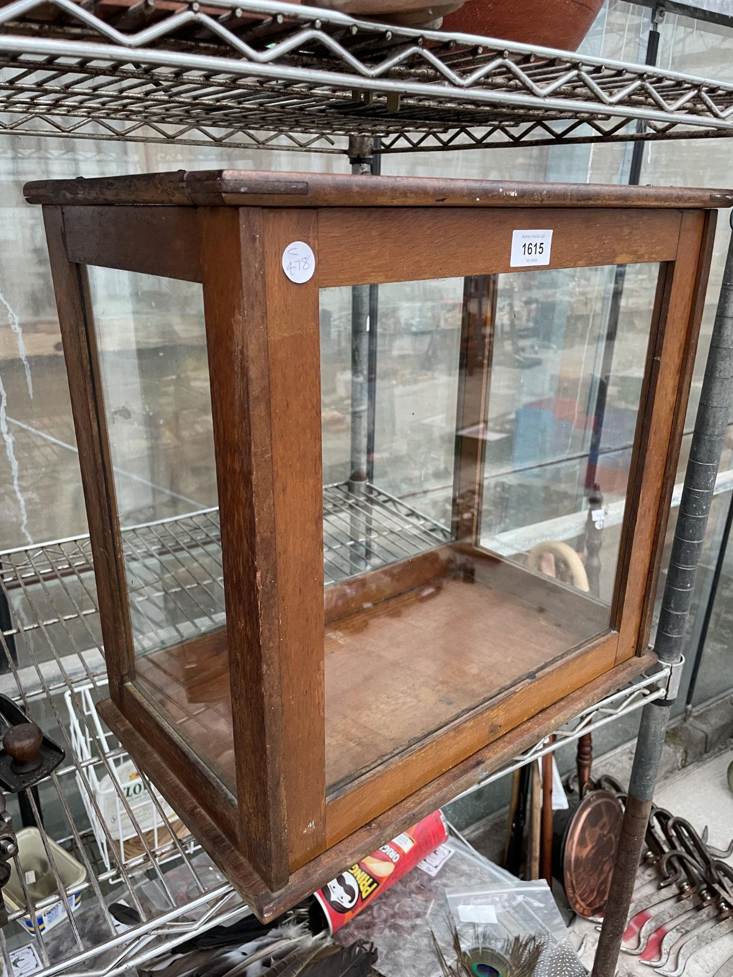 A VINTAGE OAK AND GLASS DISPLAY CABINET