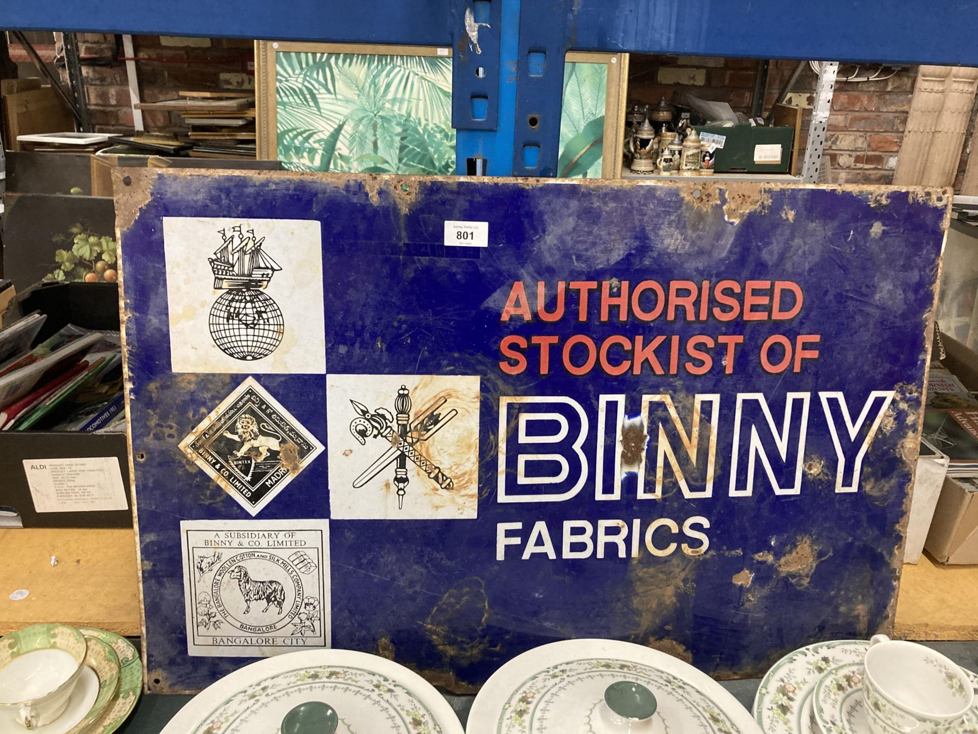 AN ENAMEL BINNY FABRICS SIGN, 76CM X 50CM