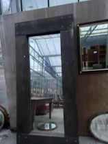 A LARGE WOODEN FRAMED INDUSTRIAL STYLE MIRROR WITH GALVANISED BOLTS, 87 X 41"