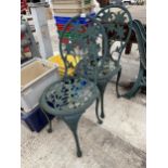 A PAIR OF DECORATIVE CAST ALLOY BISTRO CHAIRS
