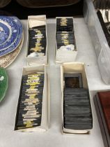 FOUR BOXES OF MAGIC LANTERN SLIDES TO INCLUDE ABBEYS AND CASTLES, ETC