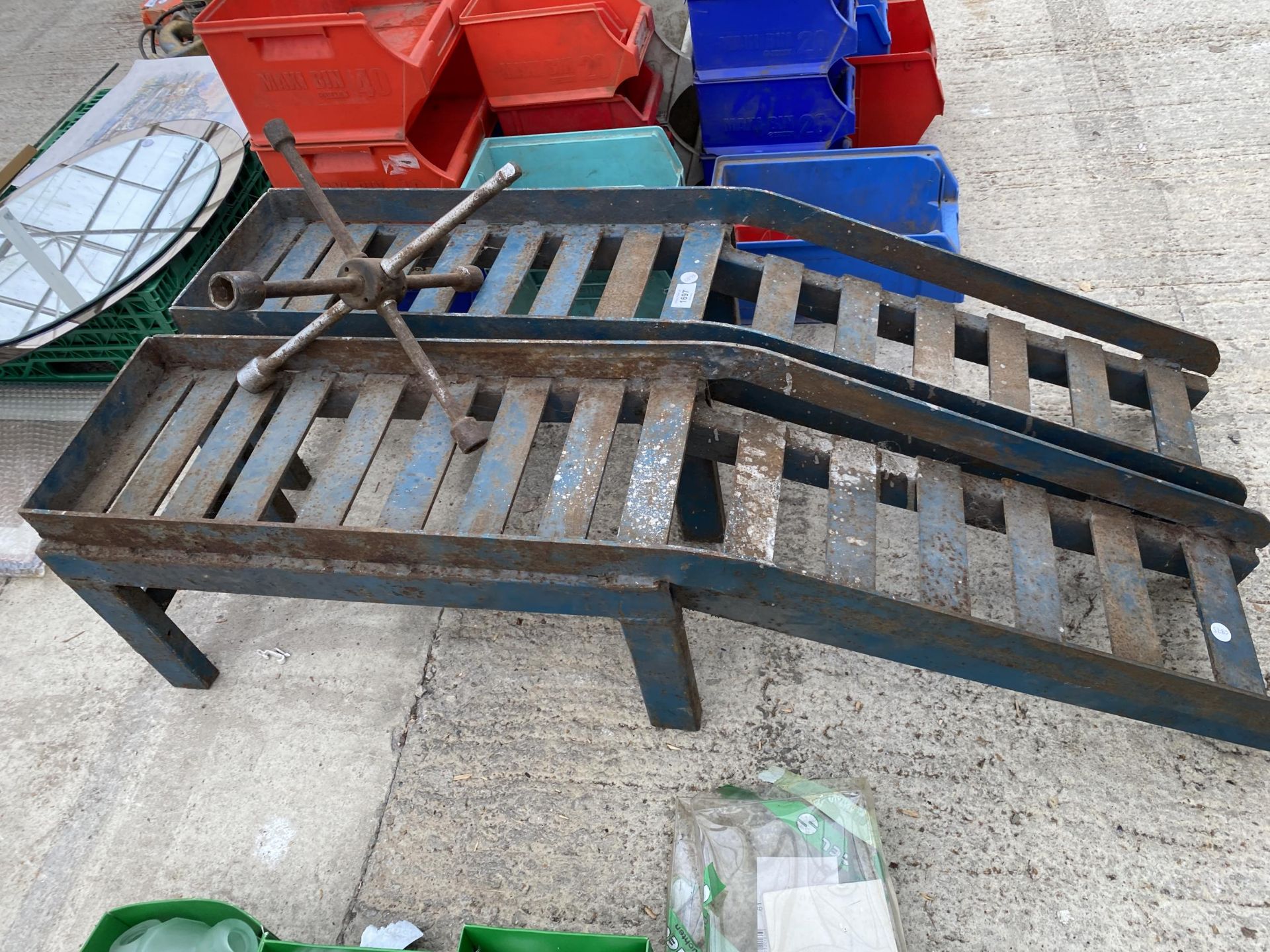 A PAIR OF HEAVY DUTY METAL CAR RAMPS AND A WHEEL BRACE - Image 2 of 2