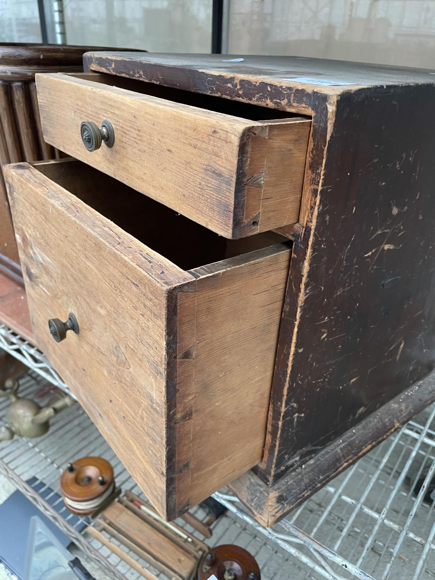 A VINTAGE WOODEN CHEST OF TWO DRAWERS - Image 2 of 3