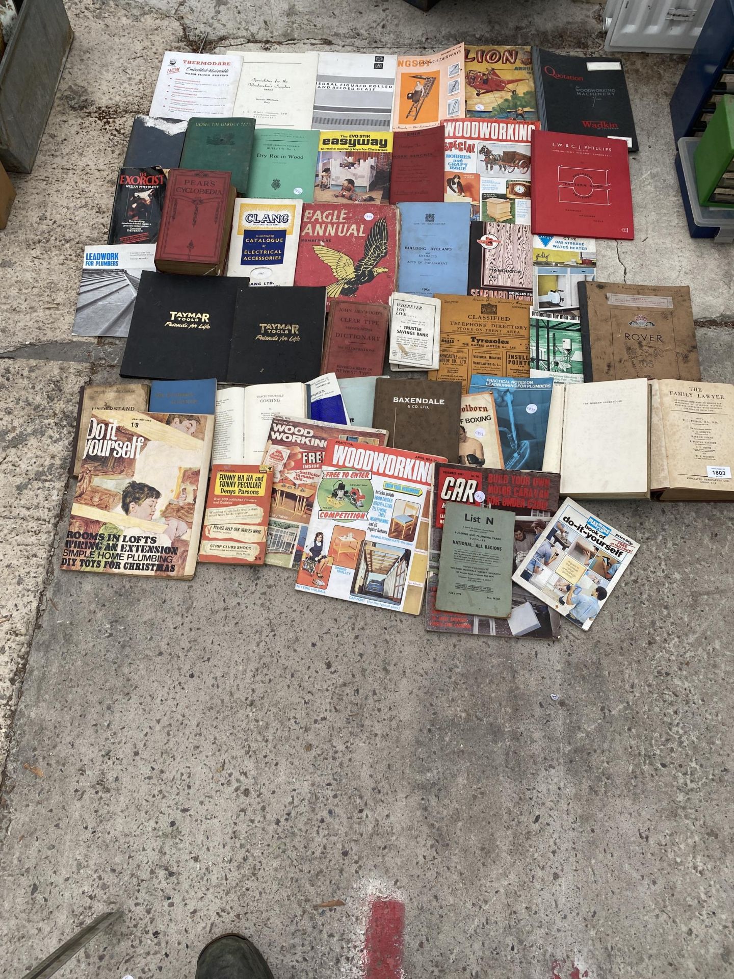 A LARGE ASSORTMENT OF DIY MANUALS AND BOOKS ETC