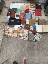 A LARGE ASSORTMENT OF DIY MANUALS AND BOOKS ETC