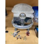 A STAR WARS MILLENIUM FALCON SHIP WITH FOUR FIGURES TO INCLUDE OBI- WAN-KENOBI, ETC