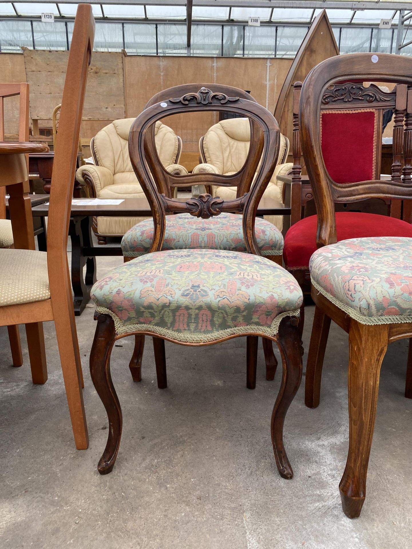 THREE VICTORIAN MAHOGANY DINING CHAIRS WITH CARVED BACK RAILS AND THREE BALLOON BACK CHAIRS - Image 4 of 4