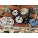 A LARGE ASSORTMENT OF VARIOUS FISHING REELS