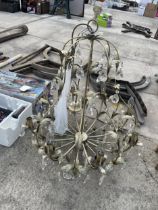 A LARGE DECORATIVE CIELING LIGHT FITTING