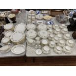 AN EXTENSIVE WEDGWOOD 'MIRABELLE' PATTERN DINNER AND TEA SERVICE COMPRISING LIDDED TUREENS, DINNER