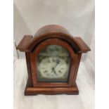 A C. WOOD & SON 31 DAY MANTLE CLOCK WITH KEY AND PENDULUM