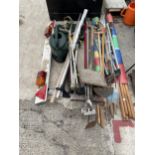 AN ASSORTMENT OF TOOLS TO INCLUDE A LIGHT BOARD, RAKES AND FORKS ETC