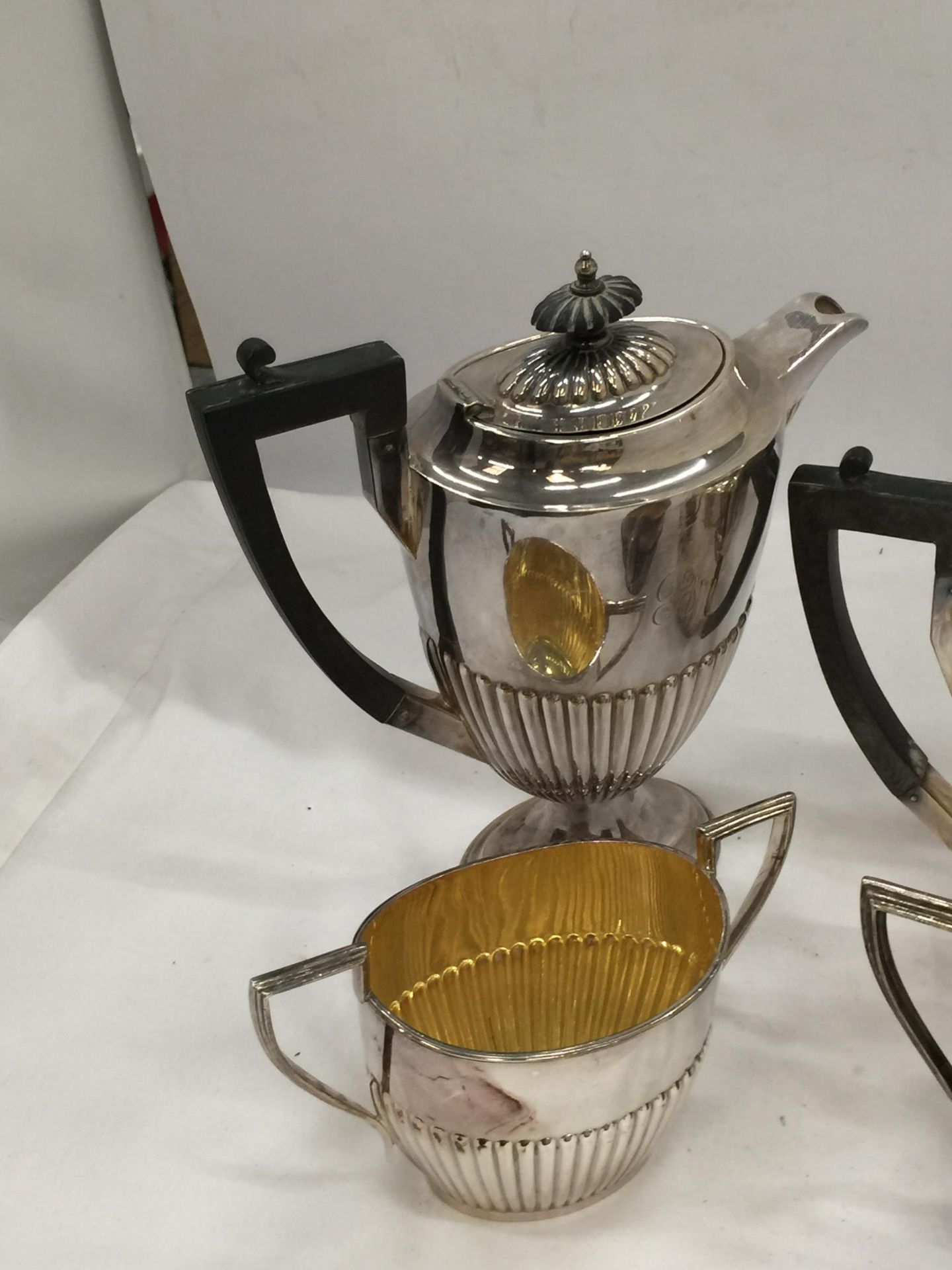 A WALKER AND HALL FOUR PIECE VINTAGE SILVER PLATED A1 EPNS TEA SET - Image 2 of 5