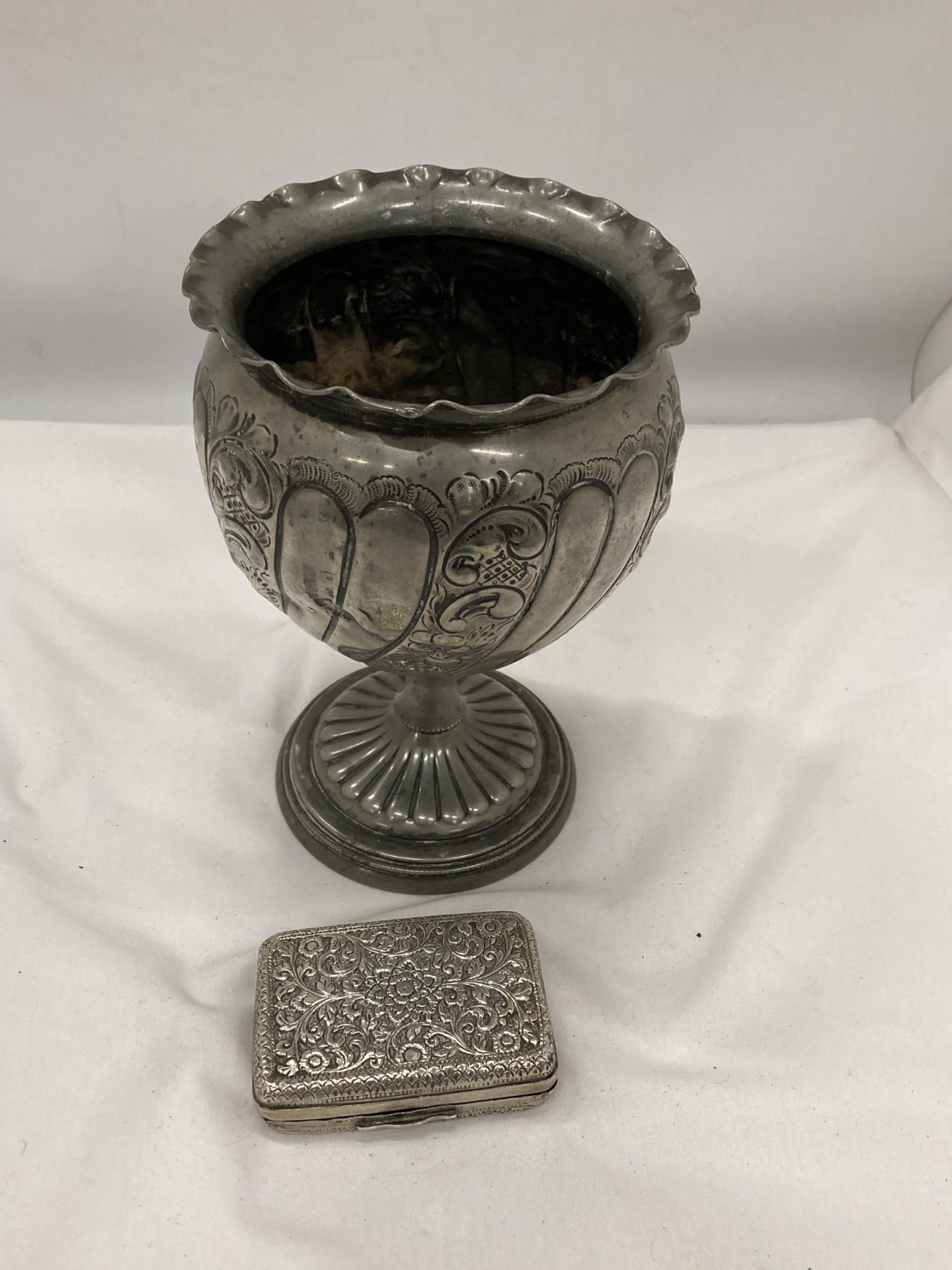 TWO ITEMS - A PEWTER PEDESTAL VASE AND A SILVER PLATED CIGARETTE CASE