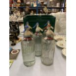 A GROUP OF FIVE HOOPER STRUVE SODA SYPHONS AND CANADA DRY BOTTLE CRATE