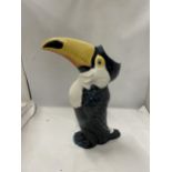 A DRAGONFLY JACK GRAHAM DESIGN TOUCAN FIGURE