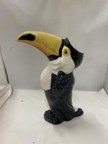 A DRAGONFLY JACK GRAHAM DESIGN TOUCAN FIGURE