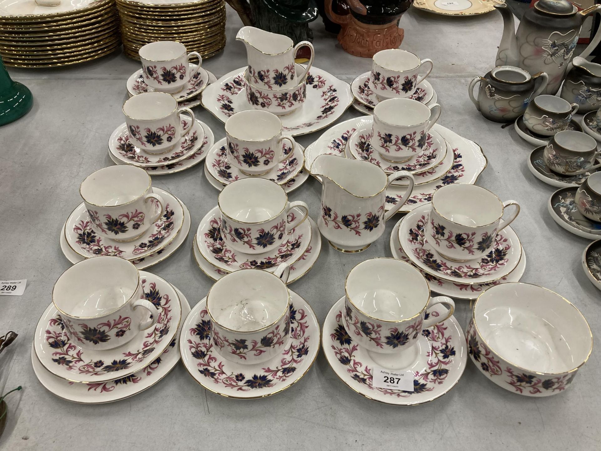 A LARGE PARAGON 'MICHELLE' PATTERN PART TEA SET