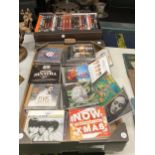 A QUANTITY OF CDS AND DVDS TO INCLUDE ELVIS, SOUL MUSIC, CHRISTMAS, OASIS, EMINEM, NEW ORDER, ETC