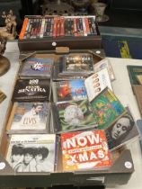 A QUANTITY OF CDS AND DVDS TO INCLUDE ELVIS, SOUL MUSIC, CHRISTMAS, OASIS, EMINEM, NEW ORDER, ETC