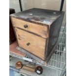 A VINTAGE WOODEN CHEST OF TWO DRAWERS