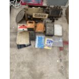 AN ASSORTMENT OF ELECTRIC SWITCH BOXES AND MANUALS ETC