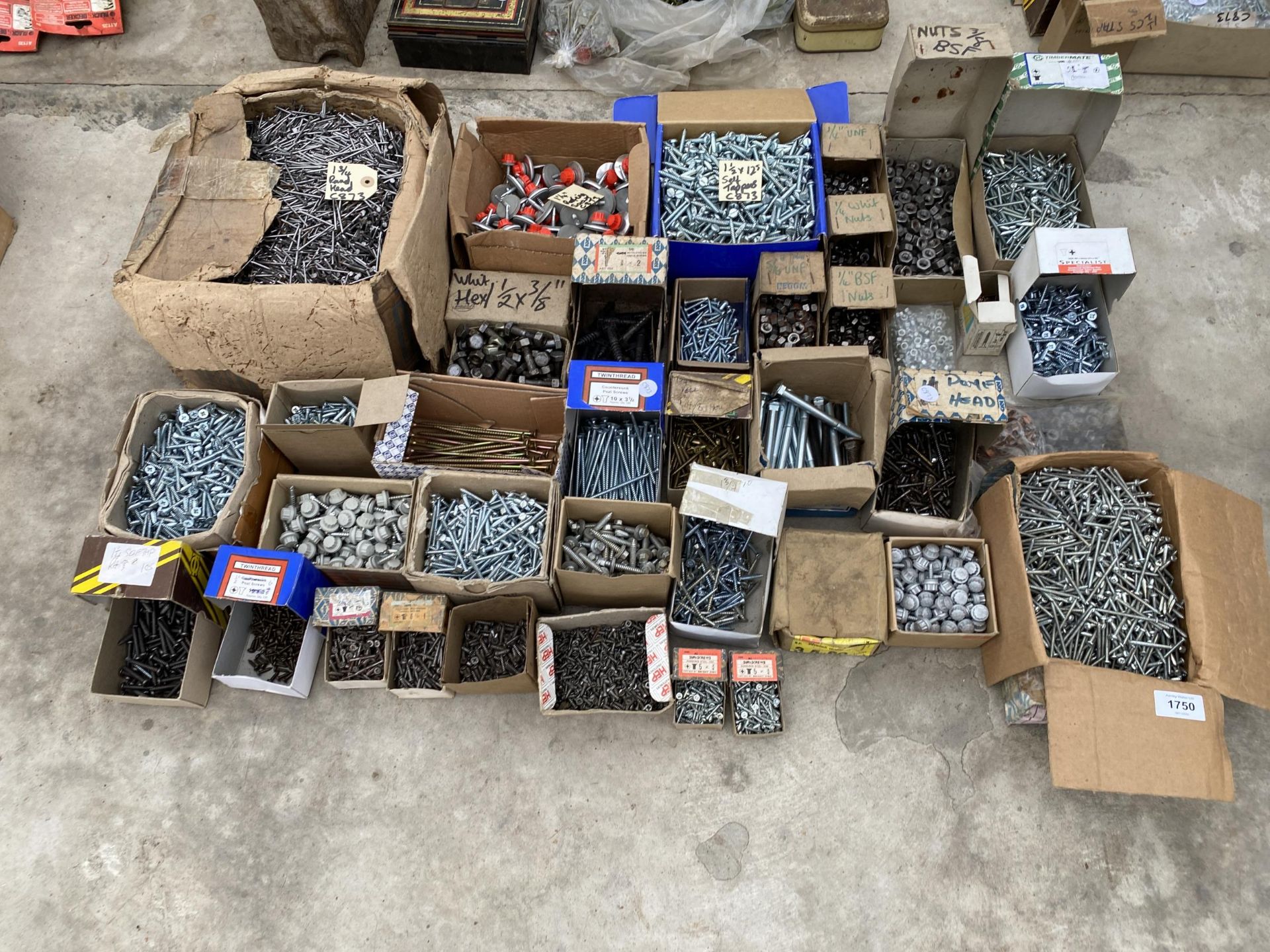 A LARGE QUANTITY OF HARDWARE TO INCLUDE SCREWS, BOLTS AND NAILS ETC
