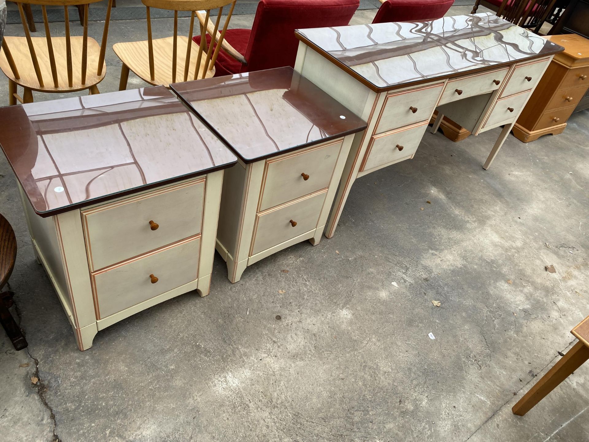 A MODERN PAINTED TWIN PEDESTAL DRESSING TABLE AND PAIR OF MATCHING BEDSIDE CHESTS