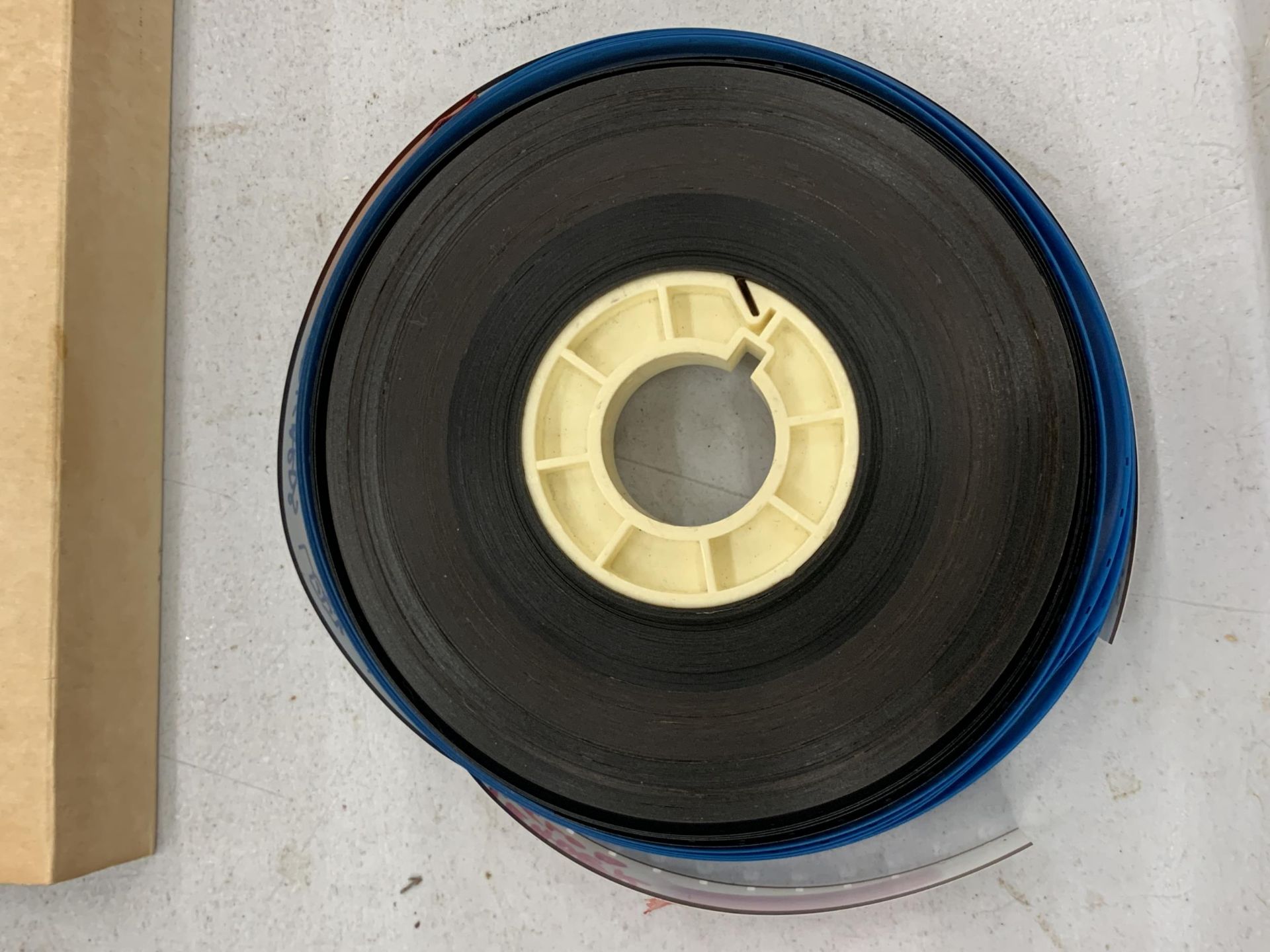 A BOXED TAPE REEL