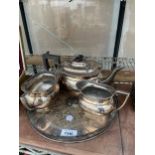 A SILVER PLATED TEA SERVICE TO INCLUDE A TRAY, TEAPOT, SUGAR BOWL AND MILK JUG