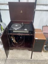 A DYNATRON SRX32 STEREO PLAYER AND A PAIR OF WOODEN CASED DYNATRON SPEAKERS