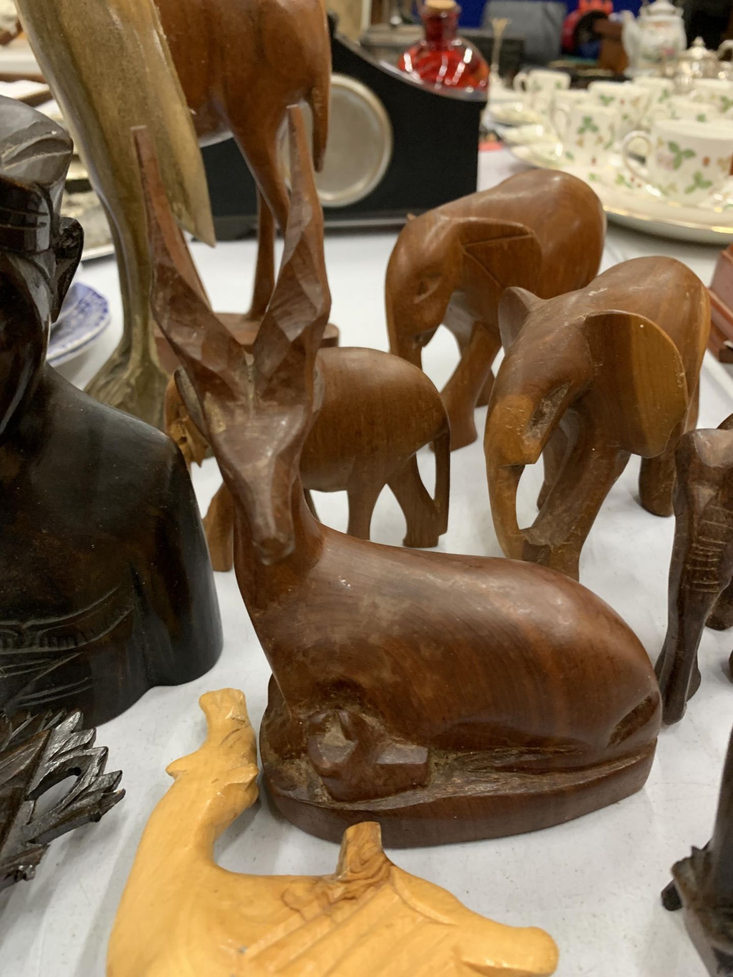 A COLLECTION OF TREEN TRIBAL WOODEN ITEMS, ELEPHANTS, MASK ETC - Image 3 of 3