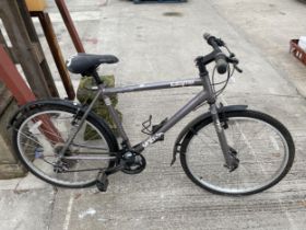 AN APOLLO GENTS BIKE WITH 18 SPEED SHIMANO GEAR SYSTEM