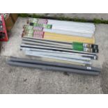 AN ASSORTMENT OF NEW AND PACKAGED FLOORING TRIMS