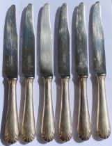 A SET OF SIX PLUS ONE FRENCH ART DECO CHRISTOFLE CTF20 PLUME PATTERN SILVER PLATED DINNER KNIVES