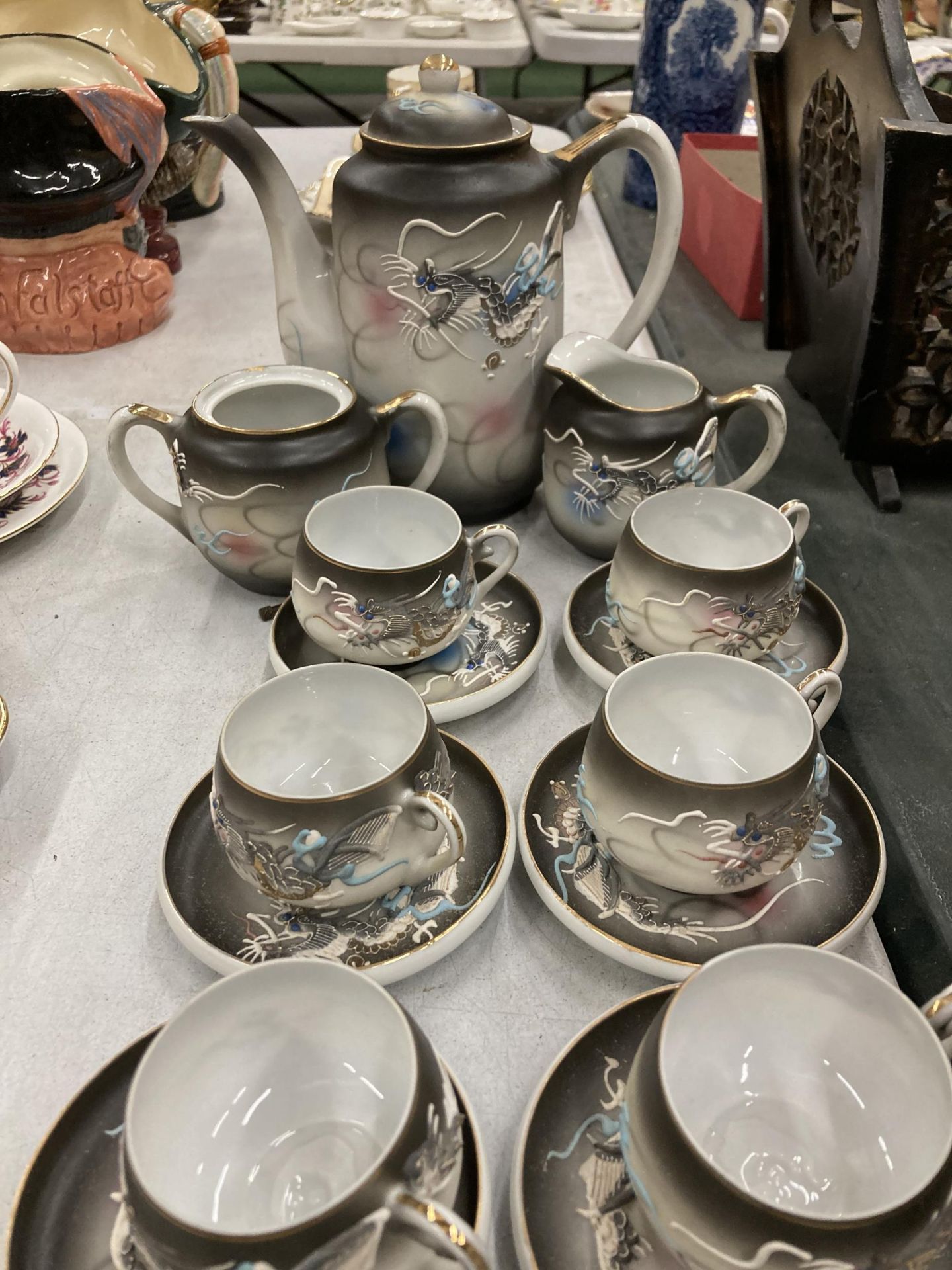 A JAPANESE 'KUTANI' CHINA COFFEE SET WITH DRAGON PATTERN AND TRANSLUCENT BASE TO THE CUPS WITH AN - Image 3 of 3