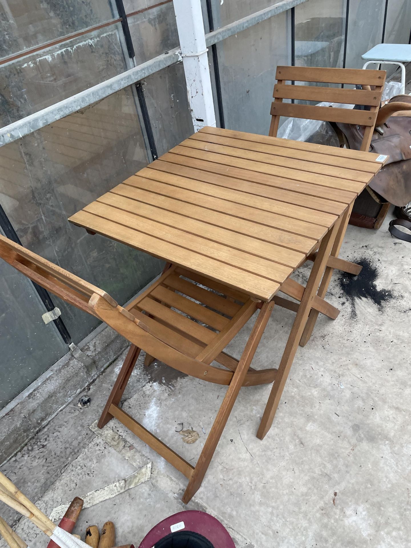 A WOODEN FOLDING BISTRO TABLE AND TWO CHAIRS - Image 2 of 2