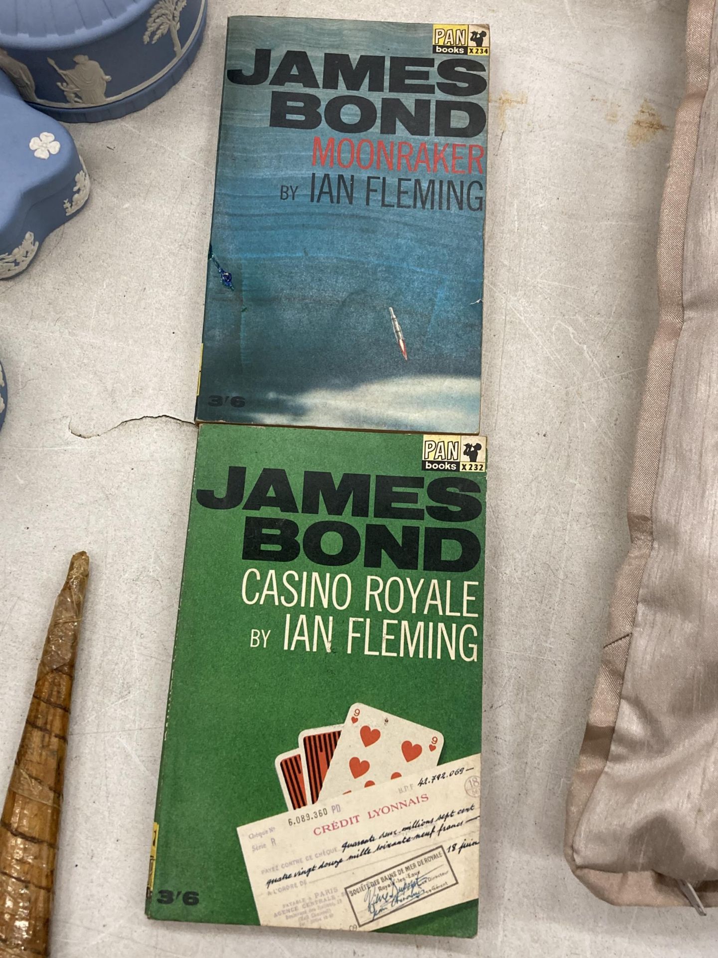 TWO VINTAGE JAMES BOND PAN BOOKS TO INCLUDE 'CASINO ROYALE' AND 'MOONRAKER'