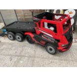 A 'SUPER CAR' BATTERY POWERED CHILDS RIDE ALONG BATTERY WAGON AND TRAILER COMPLETE WITH CHARGER,