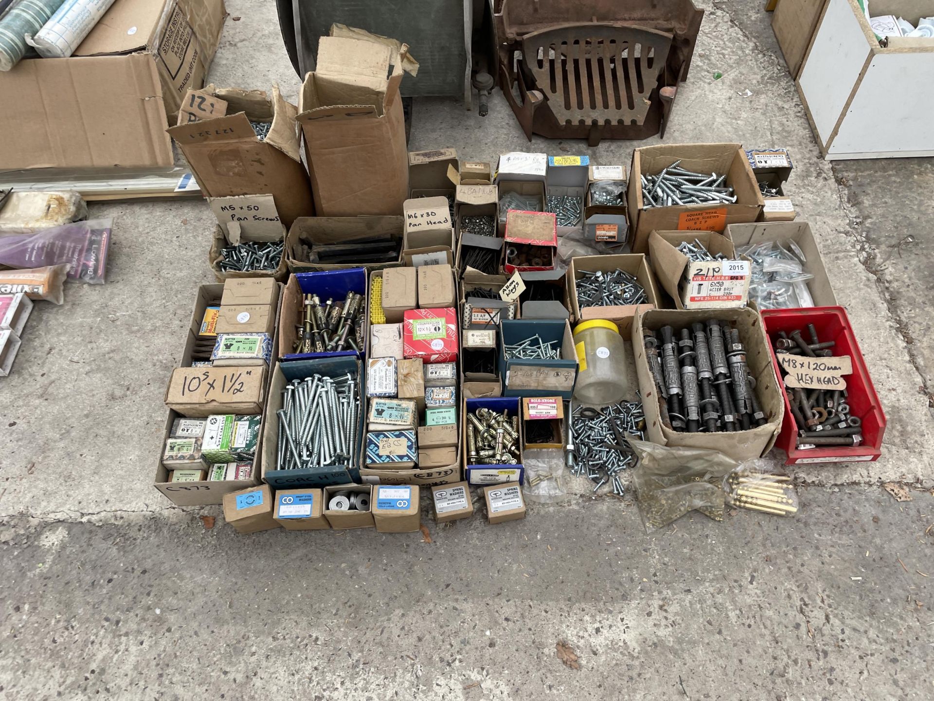 A LARGE ASSORTMENT OF HARDWARE TO INCLUDE SCREWS AND BOLTS ETC