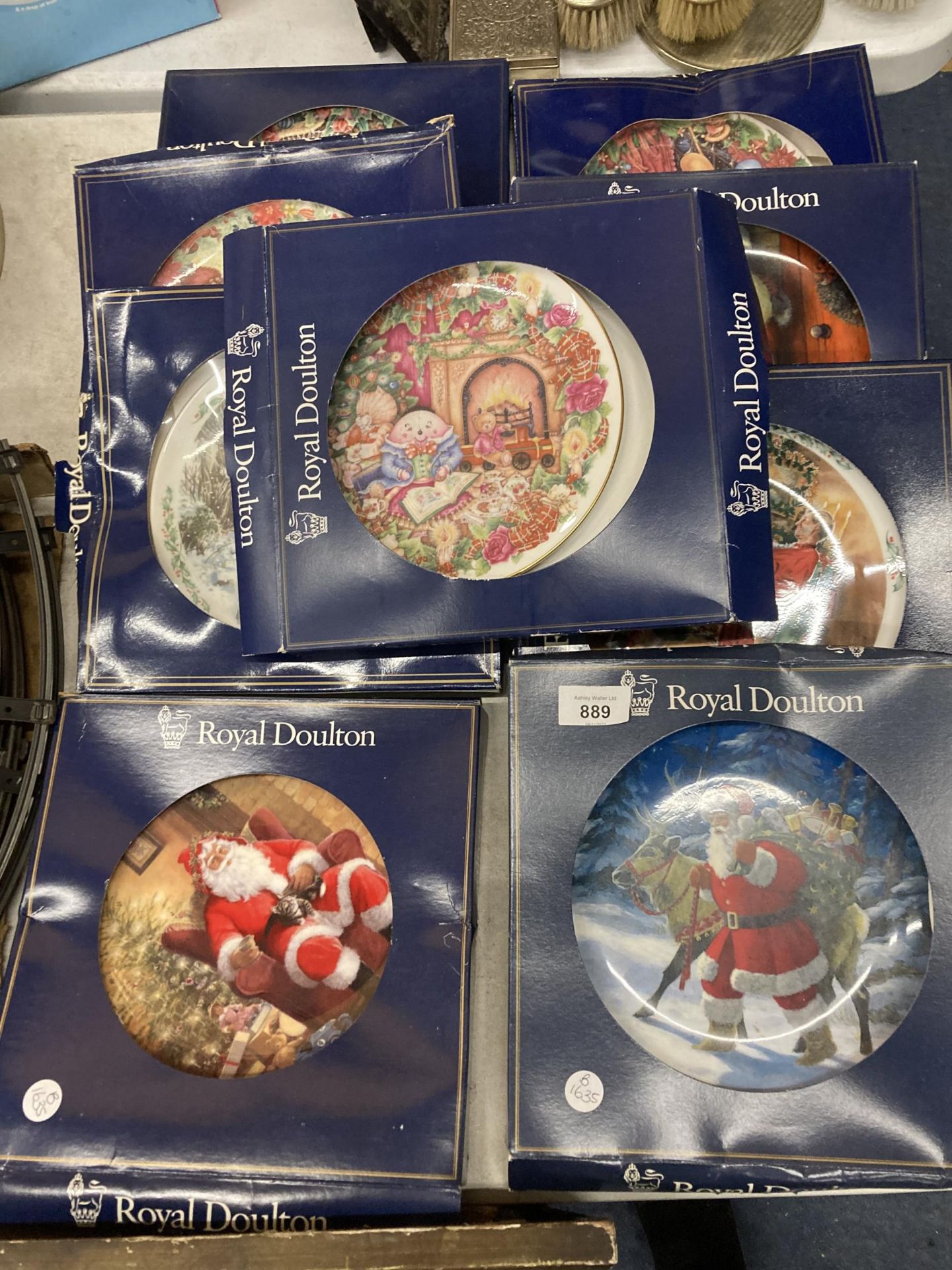 A COLLECTION OF ROYAL DOULTON CHRISTMAS CABINET PLATES - 9 IN TOTAL